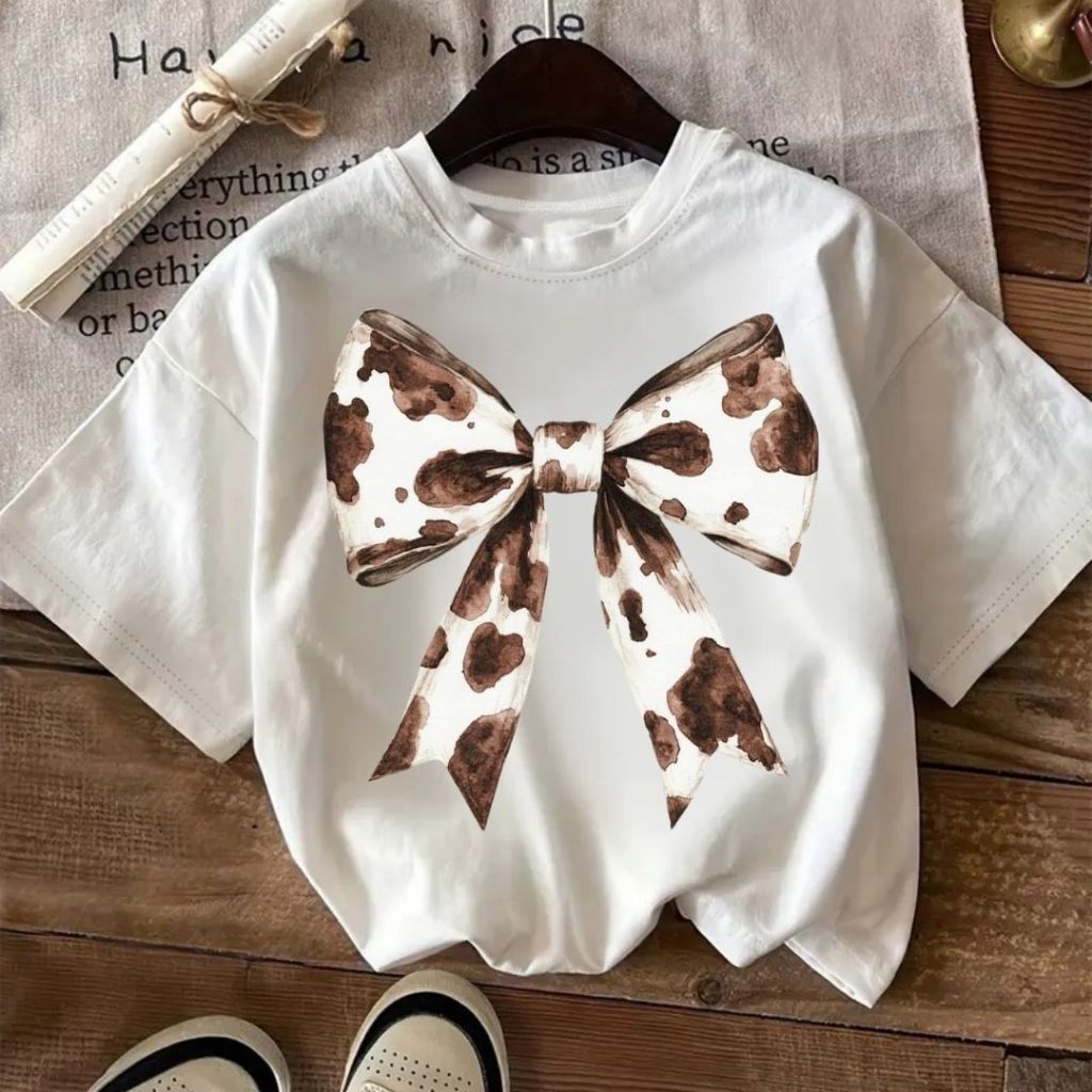 Camiseta Unissex Estampada Tendência inverno 2025 Laço Vaquinha Feminina 100% Algodão Premium em Oferta na Shopee