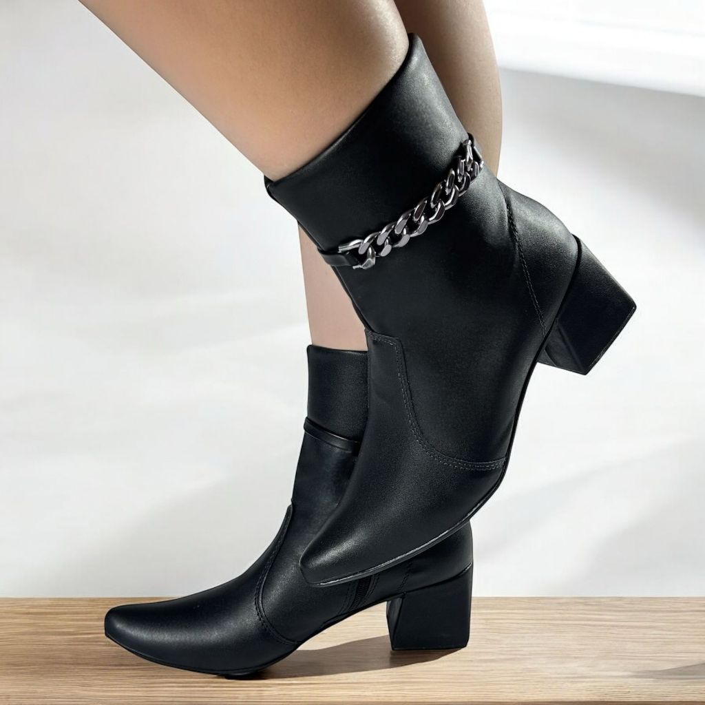 BOTA FEMININA SALTO MEDIO BLOCO DETALHE POE E TIRA EM CARRENTES DOIS EM UM