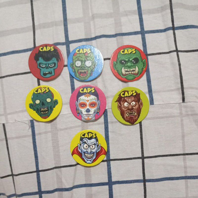 (Lote 391) - Lote com 7 itens entre Elma Chips e buzzy caps