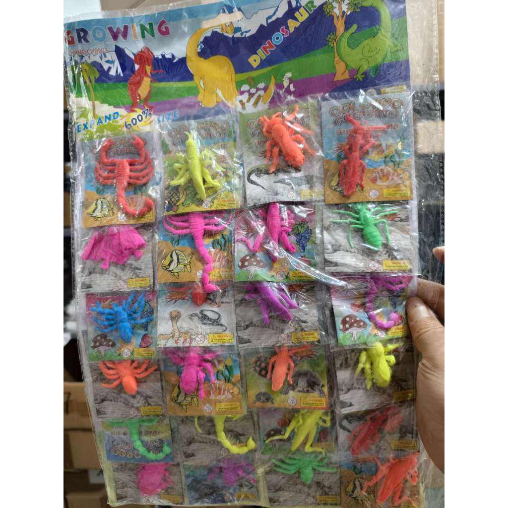 Kit Com 20 Bichinhos Que Crescem Na Água Dinossauro Cartela