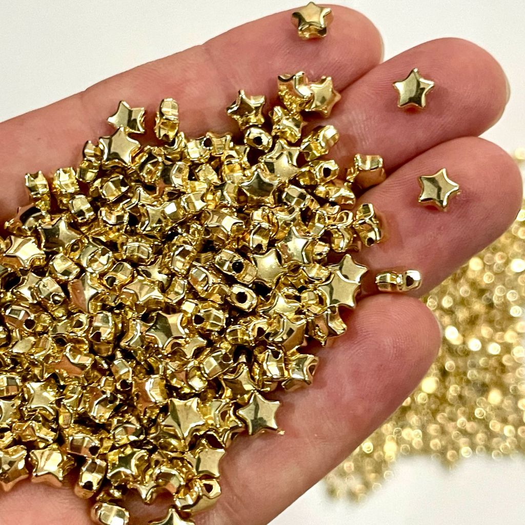 Entremeio Estrela Dourada 6mm Miçanga Infantil 20g Aprx. 340pçs em Oferta na Shopee