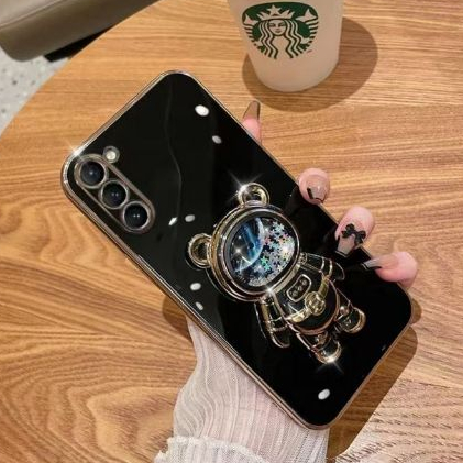 Capa Capinha de Celular Suporte Astronauta Brilho Samsung A04,A14,A24,A34,A54,M14,M34,M54,S20FE,S21FE,S23FE,S24FE