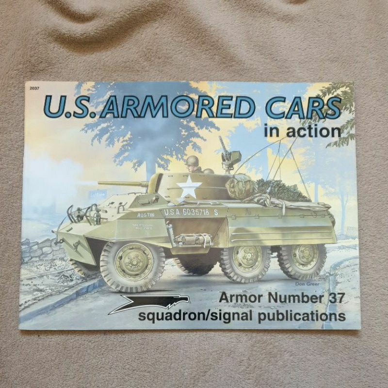 U.S. Armored cars in action