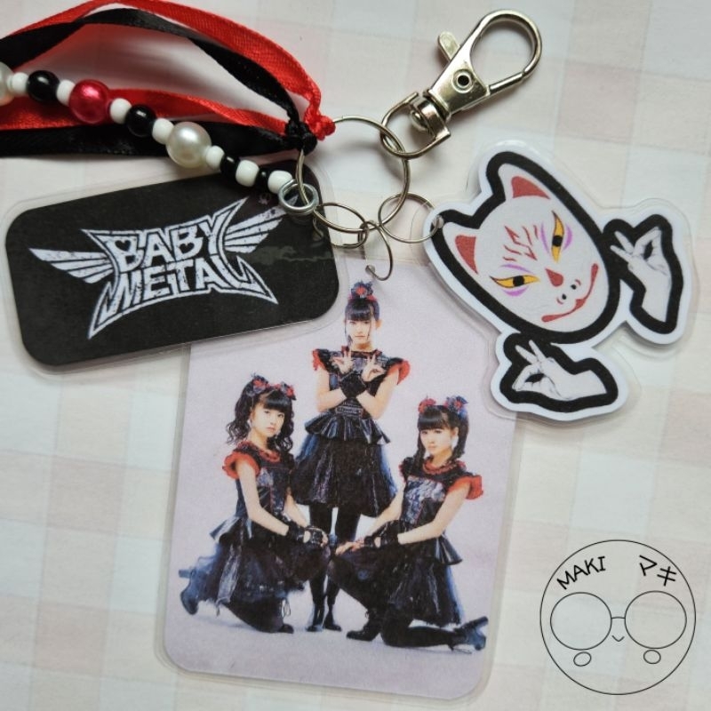 Chaveiro Plastificado Baby Metal em Oferta na Shopee