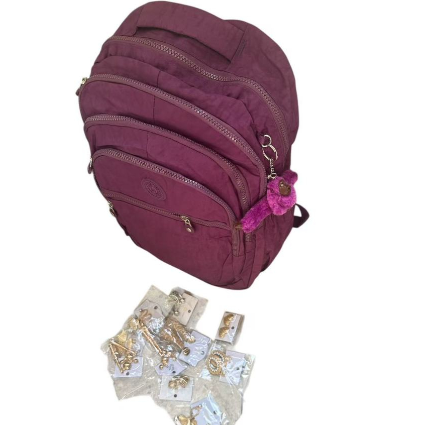 Mochila escolar e para viagem grande com chaveiro e mais um pares de brinde de brinco argola 3 fios elegante preco otimo