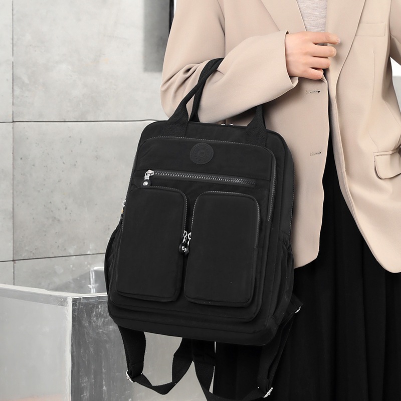 Xaviera Bolsa mochila feminina nylon impermeável leve com pompom XV-2411 em Oferta na Shopee