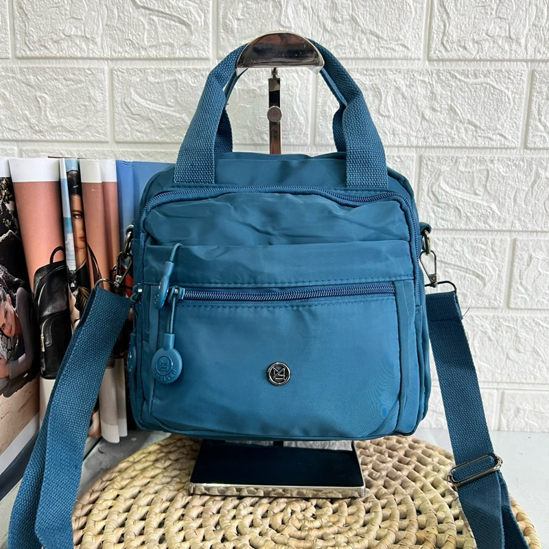 Bolsa feminina nylon impermeável vira mochila transversal tiracolo leve 3em1 em Oferta na Shopee