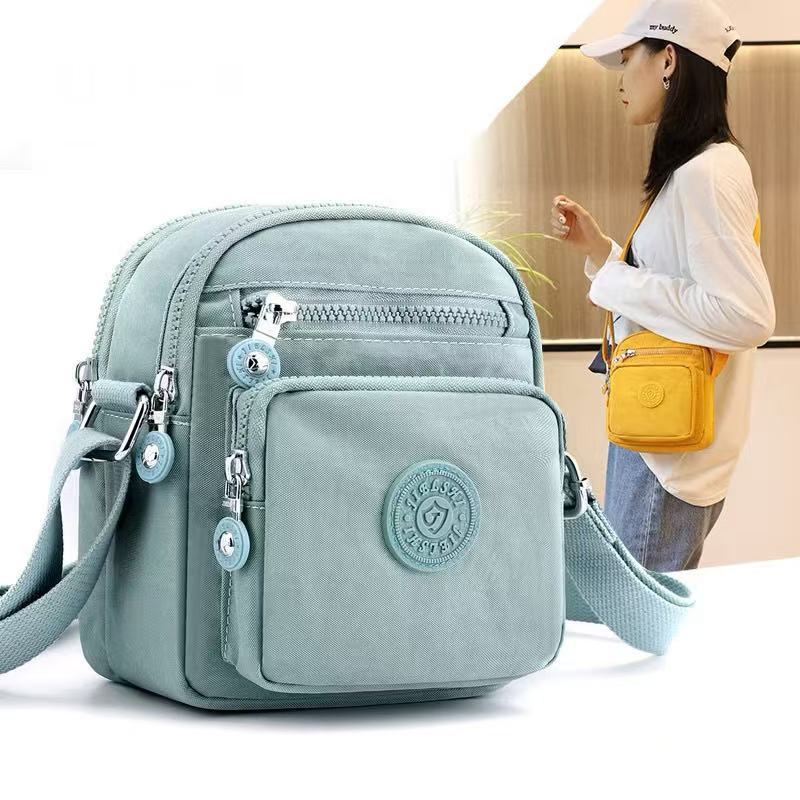 Bolsa Feminina Pequena Porta Celular Transversal Nylon Casual em Oferta na Shopee