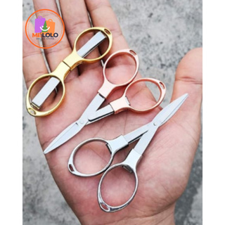 Tesourinha Dobrável Inox Afiada | Compacta e Portátil | Cabe no Bolso em Oferta na Shopee