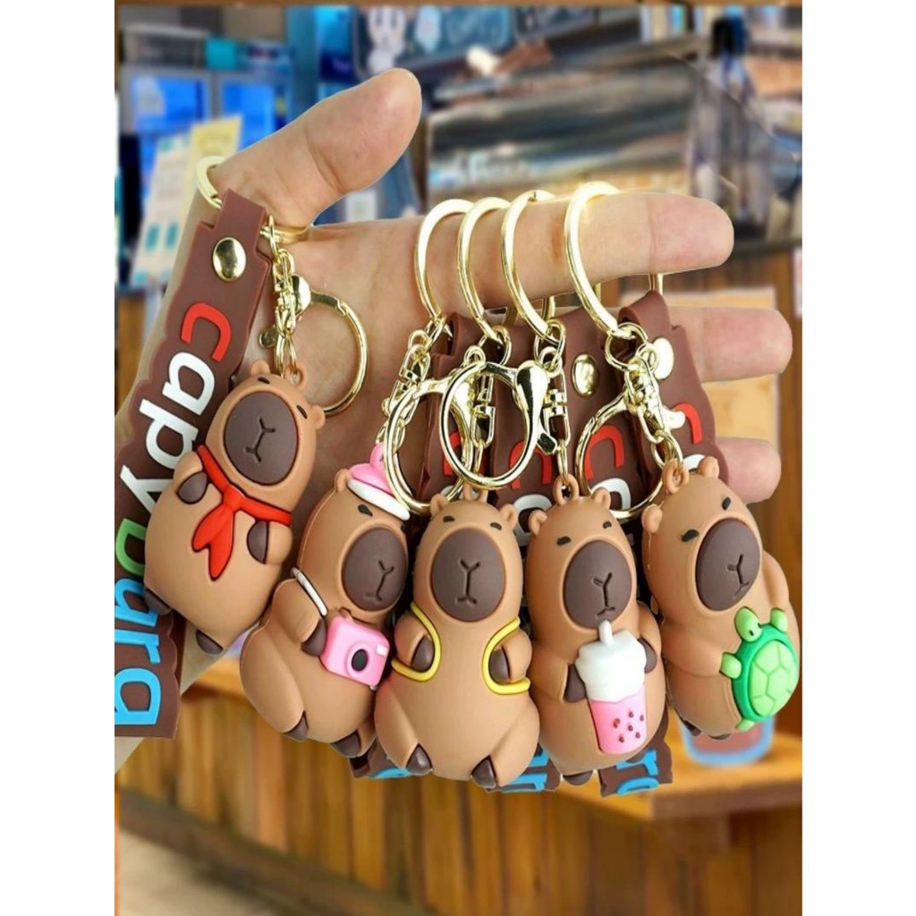 Kit Com 2 Carabina capivara Carabina chaveiro Casal dos desenhos animados Casal bebê chaveiro do carro