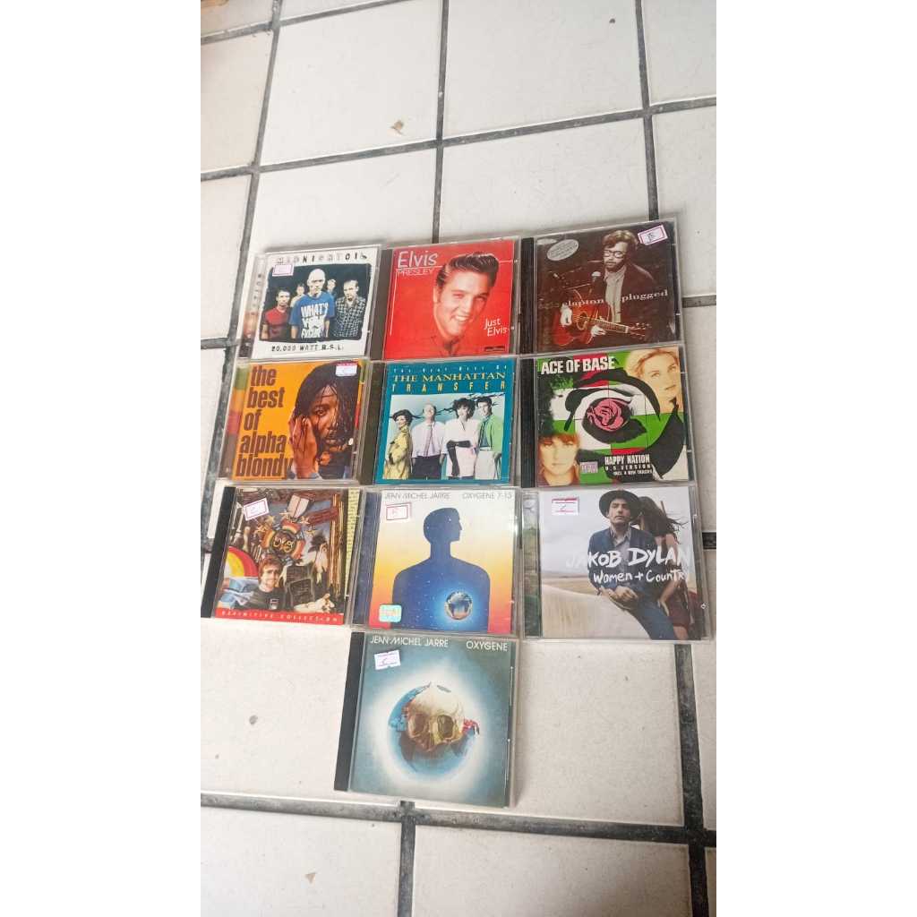 CD´ Elvis Presley,Jacob dylan,Elo,Eric Clapton,Midnight oil,Alpha blondy,ace of base,outros,