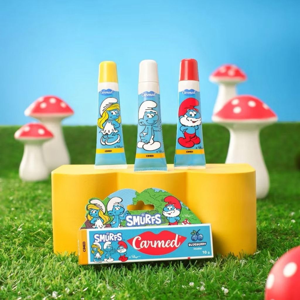 Carmed Hidratante Labial Smurfs Blueberry Açaí Oakberry Água De Côco Melancia Brigadeiro F...