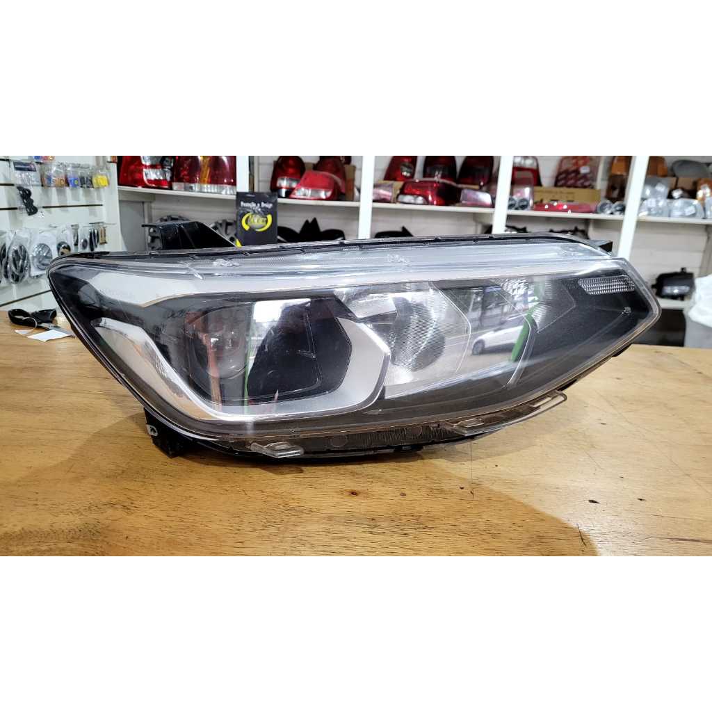 Farol Direito Tracker 20/22 SEM led original 26306473