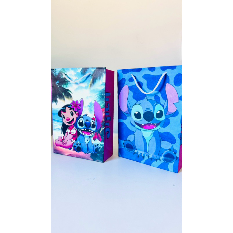 10/30/40/50 unidades de sacola de papel lilo e stitch 3 medida 24x17x6cm as sacolas já vão prontas para uso!