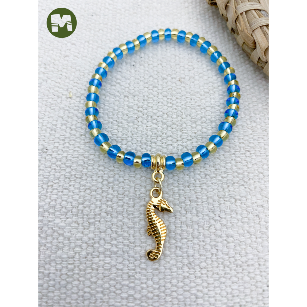 Pulseira de Logunedé – Miçangas Jablonex Azul Claro e Dourado | Umbanda e Candomblé