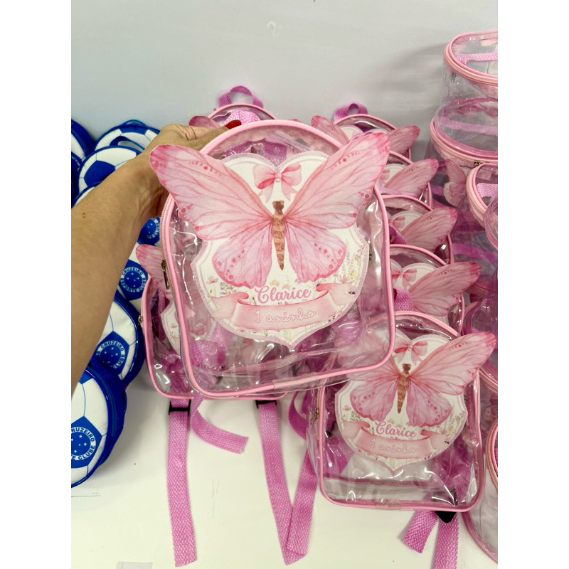 Mochilinha P transparente c/ aplicação 19x24 Personalizada, fazemos qualquer tema! Brinde, Festa, Evento, Infantil em Oferta na Shopee