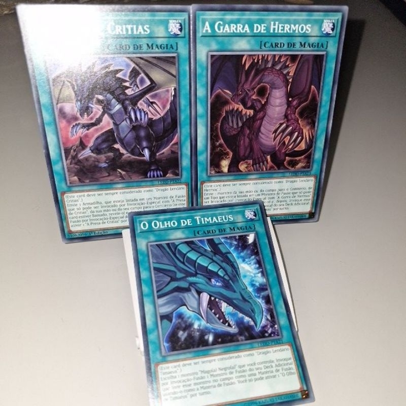 O Olho de Timaeus, A Presa de Critias, a Garra de Hermos - trio de cartas Originais Yu-Gi-Oh / Yugioh