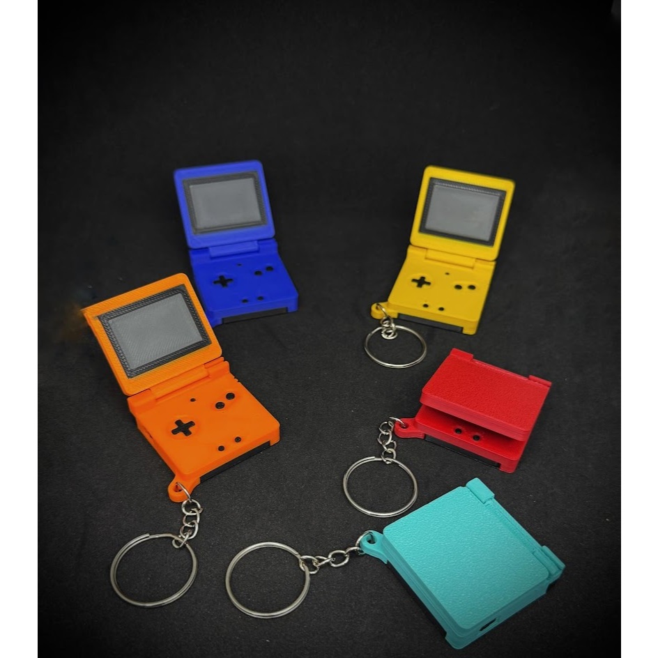 Chaveiros Consoles Retrô Game Boy Advance SP Articulado, Game Boy Advance, Game Boy Color e NES Nintendo