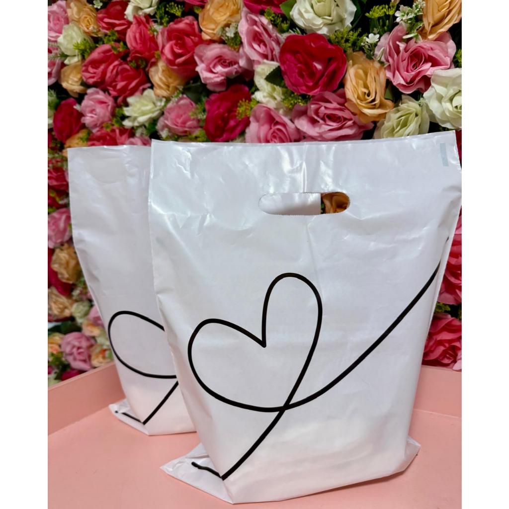 Sacolas Plasticas Para Loja 30x40, boca de palhaço/alça vazada na cor BRANCA - Kit com 100 unid