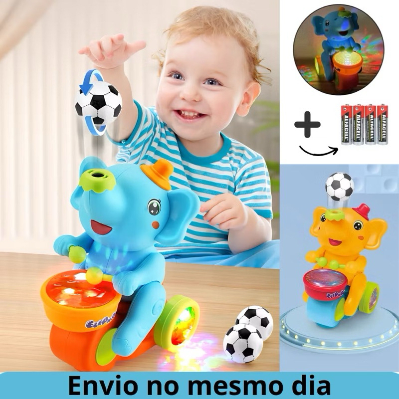 Brinquedo Infantil Colorido Elefante Baterista Que Anda Com Rodinhas E Assopra Uma Bola Para O Alto em Oferta na Shopee