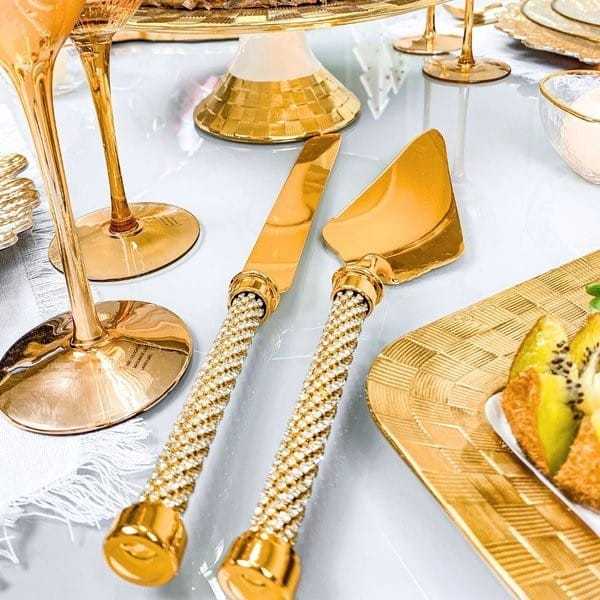 CONJUNTO 2 PEÇAS TALHERES  ZAMAC DOURADO CABO COM STRASS FACA E ESPÁTULA PARA BOLO OU TORTA WOLFF MESA POSTA