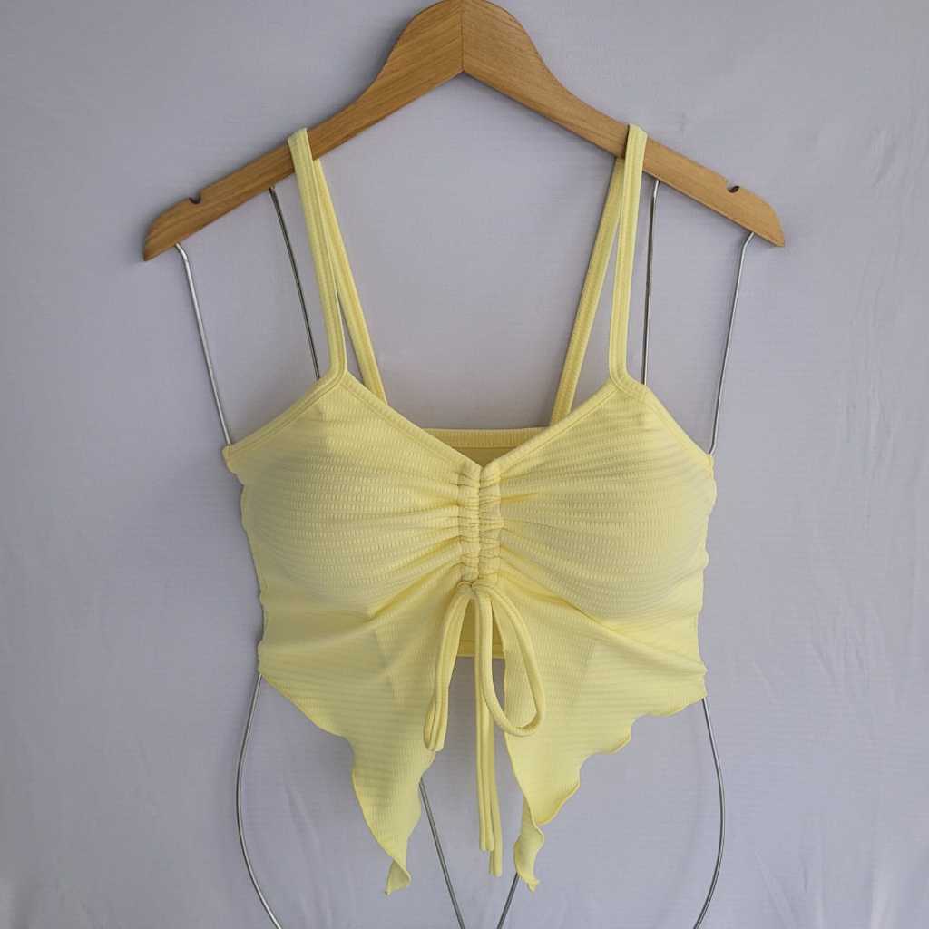 Blusa Cropped Feminina Moda 2025 Tendência Malha Canelada Com Bojo Amarração Ajustável em Oferta na Shopee