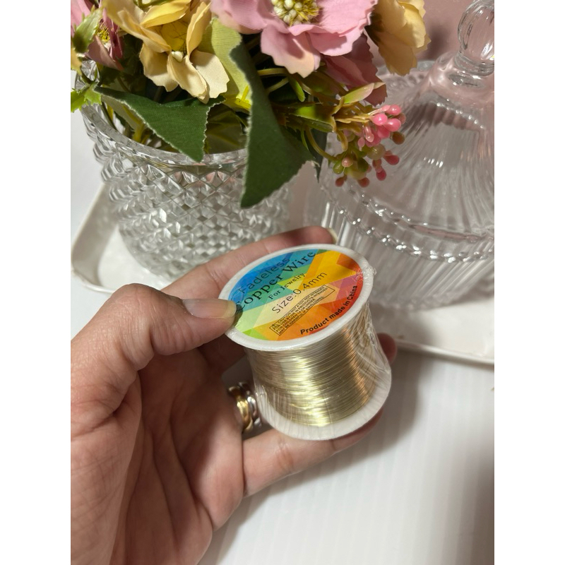 Fio copper (cabelo de anjo) 0,4mm com 100 metros dourado claro em Oferta na Shopee