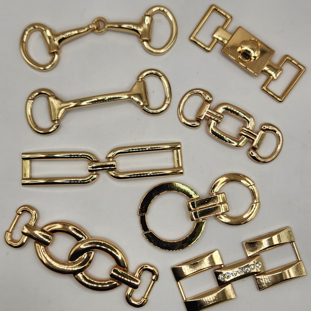 FIVELAS PASSANTES ORAGANICA METAL PARA CINTO ROUPA BIQUINI MODA GERAL em Oferta na Shopee