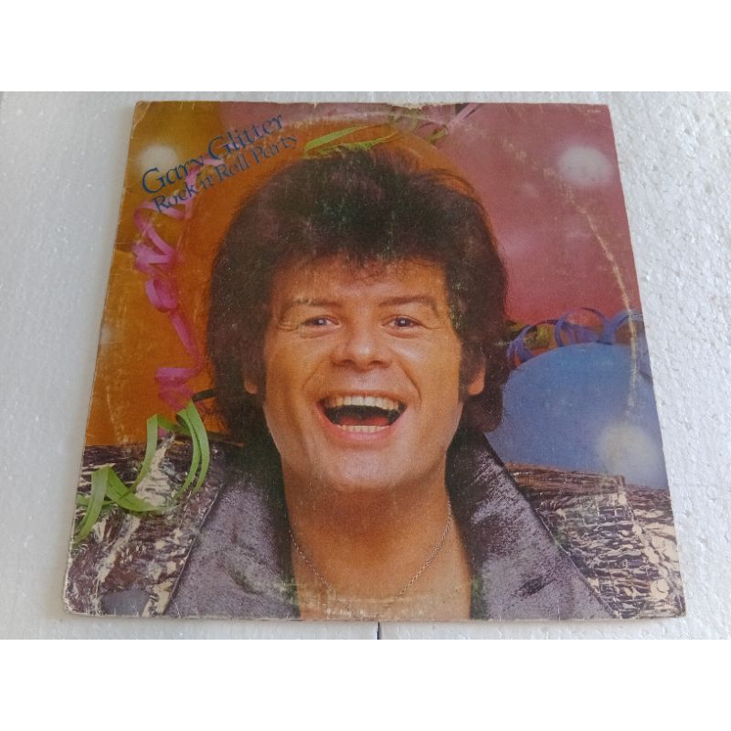 LP gary glitter rock'n'roll party vinil ótimo capa com desgates na parte superior