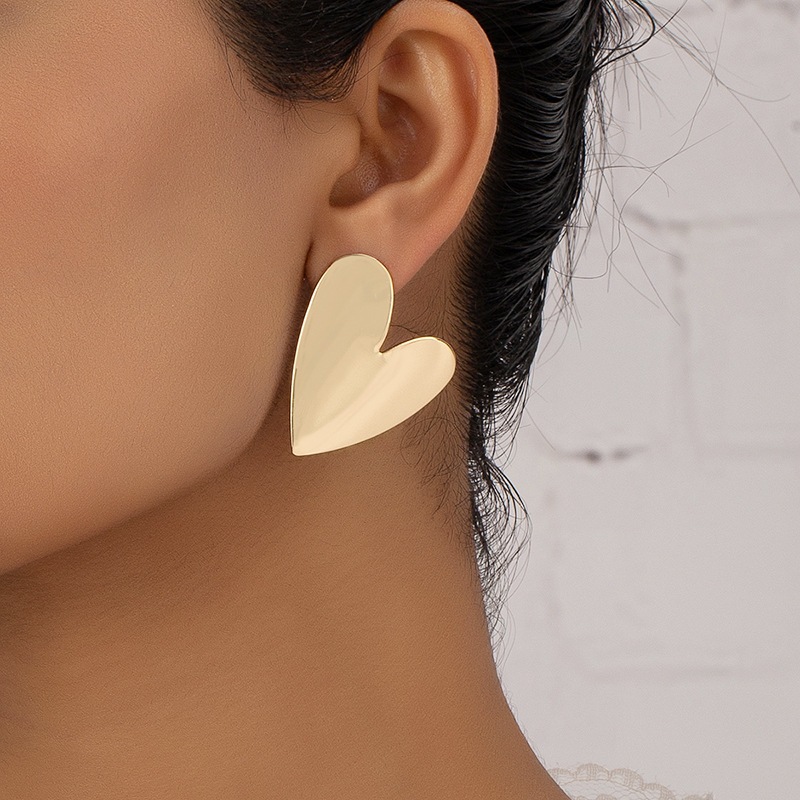 "Brinco Coração Prata e Dourado Espelhado – Amor com Brilho e Atitude" em Oferta na Shopee