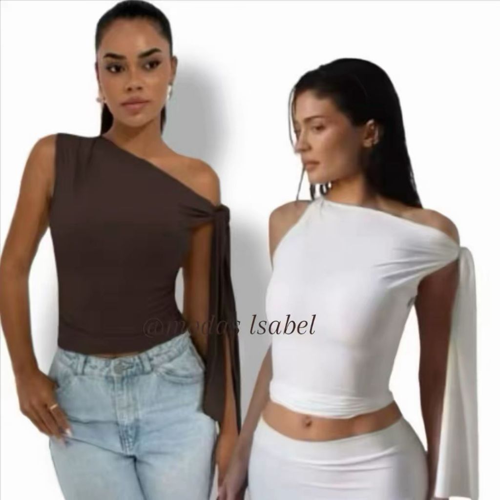 BLUSA DE AMARRACION NO HOMBRO com detalhe de amarração,cores variadastecido macio combinada com jeans claros