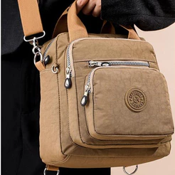 Bolsa Multifuncional em Nylon - Impermeável, Resistente e Estilosa para Viagens e Dia a Dia