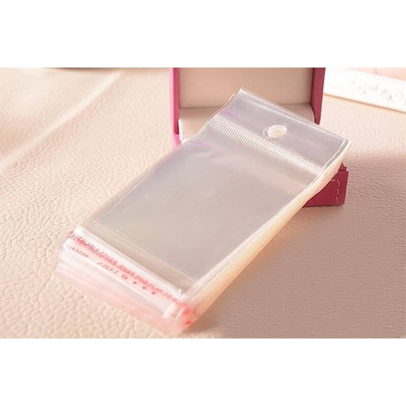 SACO ADESIVADO COM FURO (MILHEIRO) VÁRIAS MEDIDAS em Oferta na Shopee