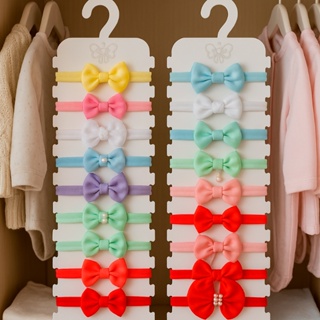 Oferta kit 2 Cabides Porta Faixa Bebê Para Organização dos Laços e Tiaras em Oferta na Shopee