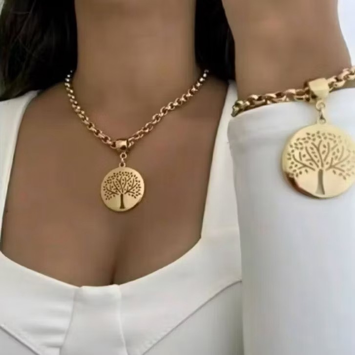 Colar e pulseira feminina de ouro e aço com pingente de árvore da vida, design elegante, simbolizando prosperidade em Oferta na Shopee