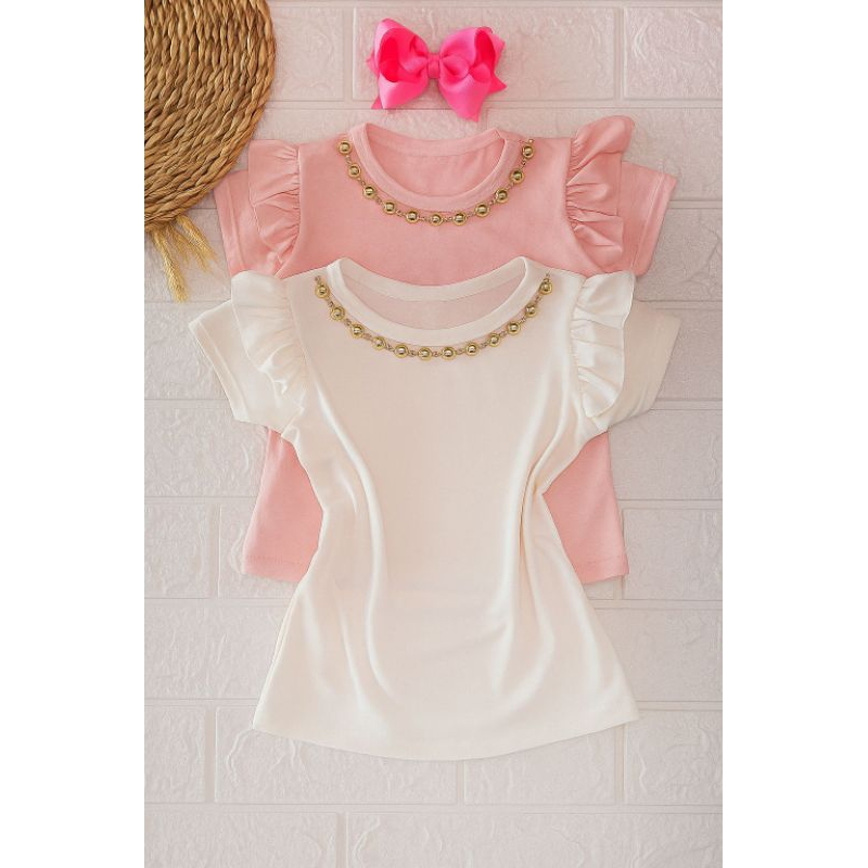 Duas blusas infantil com babadinho e aplicações na gola em Oferta na Shopee