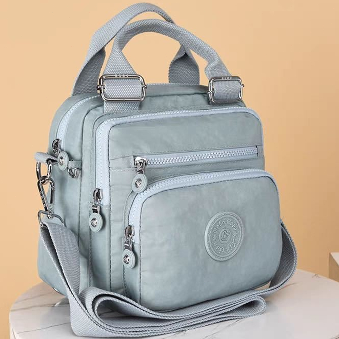 Bolsa feminina nylon impermeável vira mochila transversal tiracolo leve 3em1 em Oferta na Shopee