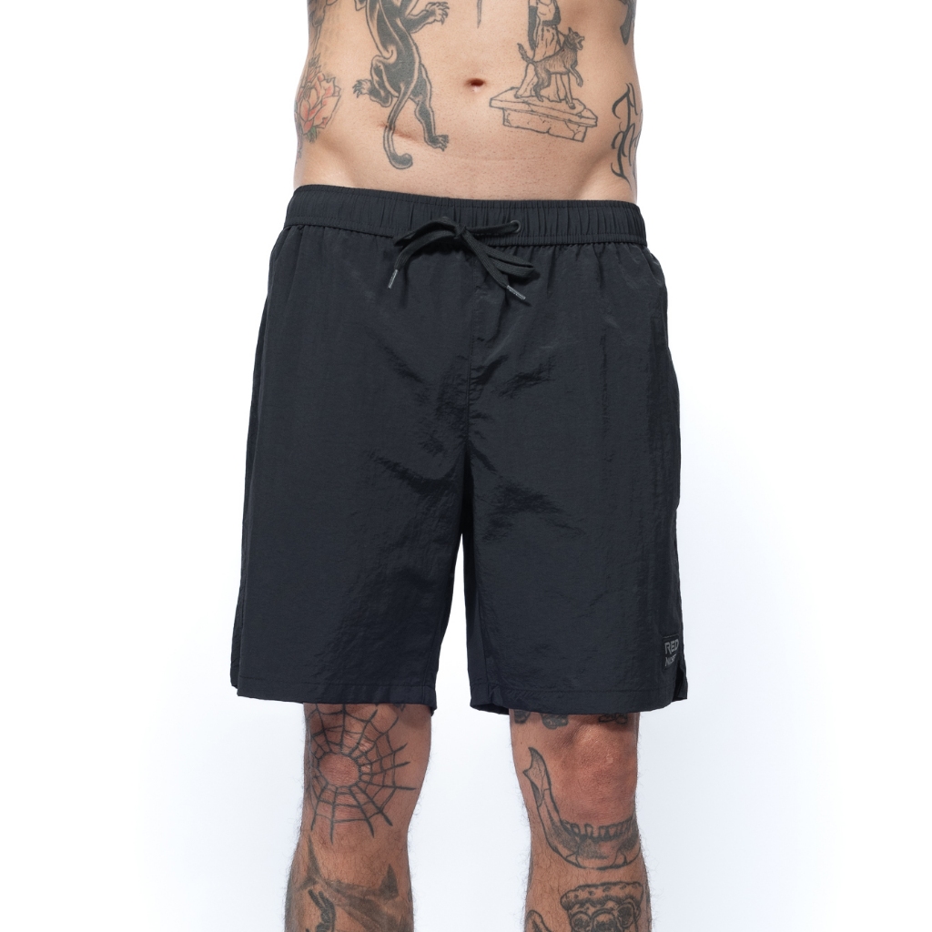 Detalhes do Shorts Red Nose Origin