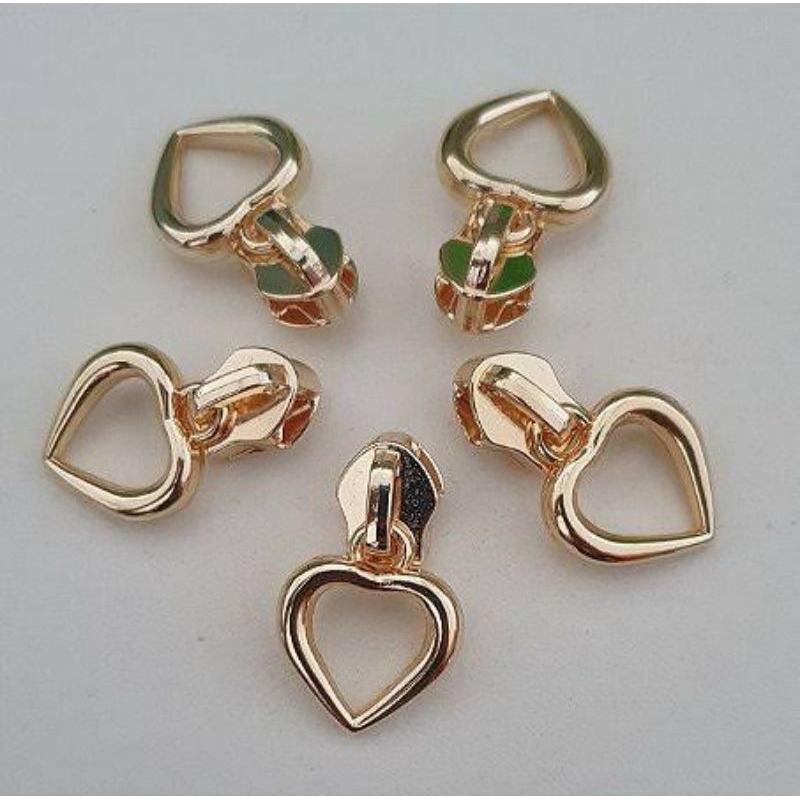 Cursor coração número 5 no dourado cataforetico e níquel, com 10 unidades. em Oferta na Shopee