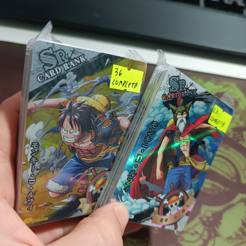 kit cartas de One Piece, todas brilhantes marca CardToon e Little Flog, kits com até 108 cartas