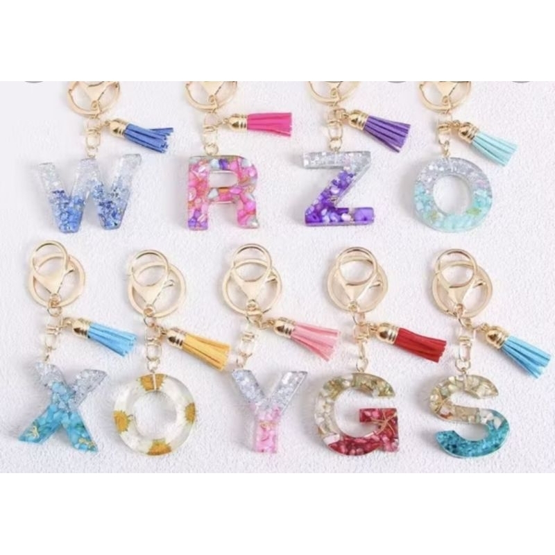 chaveiros em resina todas as letras personalizadas, lembrancinhas e presente casamento, batizado , aniversário.