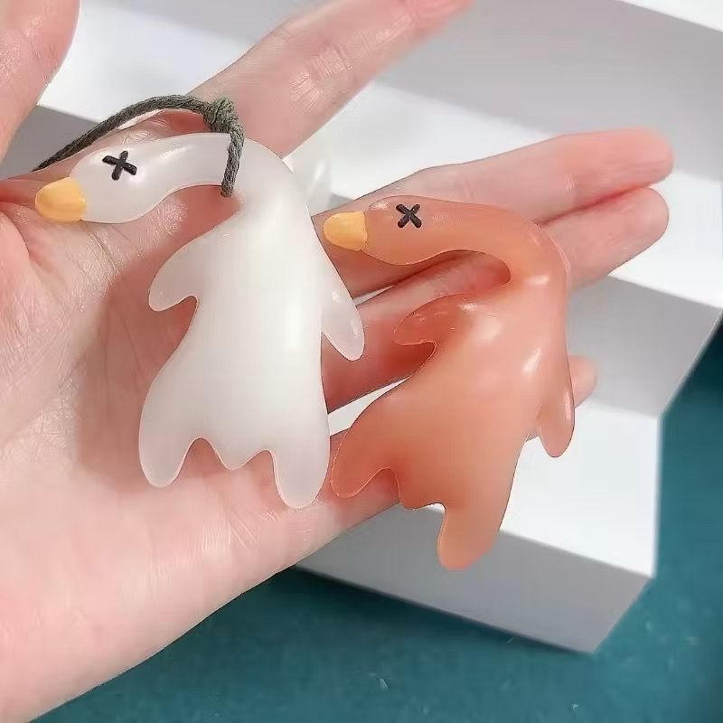 Kit Duplo – Chaveiro Pato que Muda no Sol e Ilumina à Noite