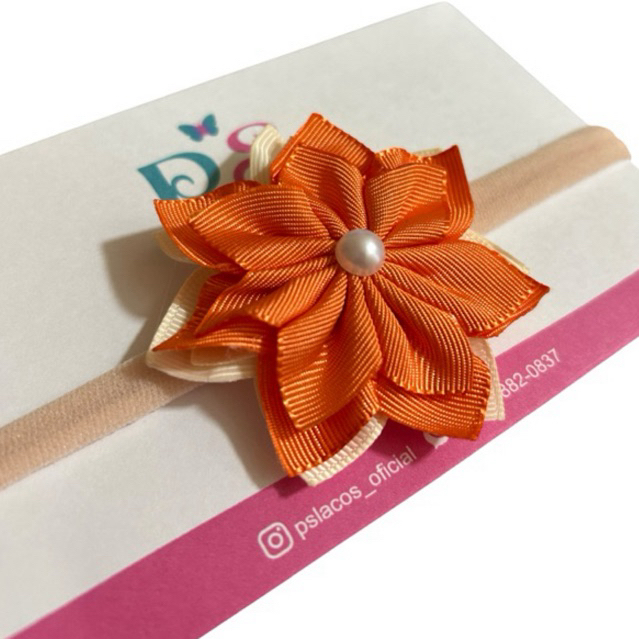 Faixinha de cabelo flor moana baby em Oferta na Shopee