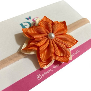 Faixinha de cabelo flor moana baby em Oferta na Shopee