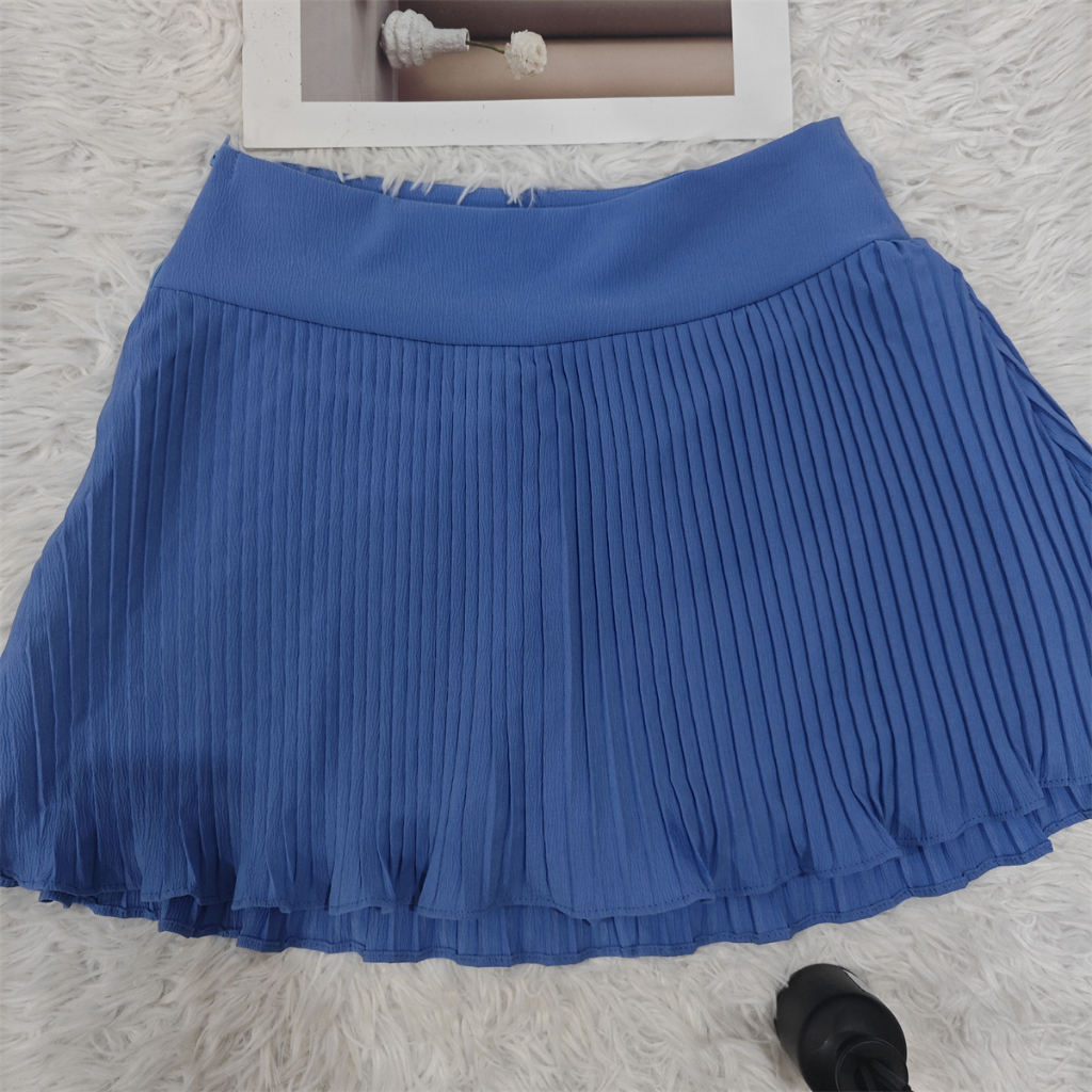 Short saia plissada de cor sólida feminina
