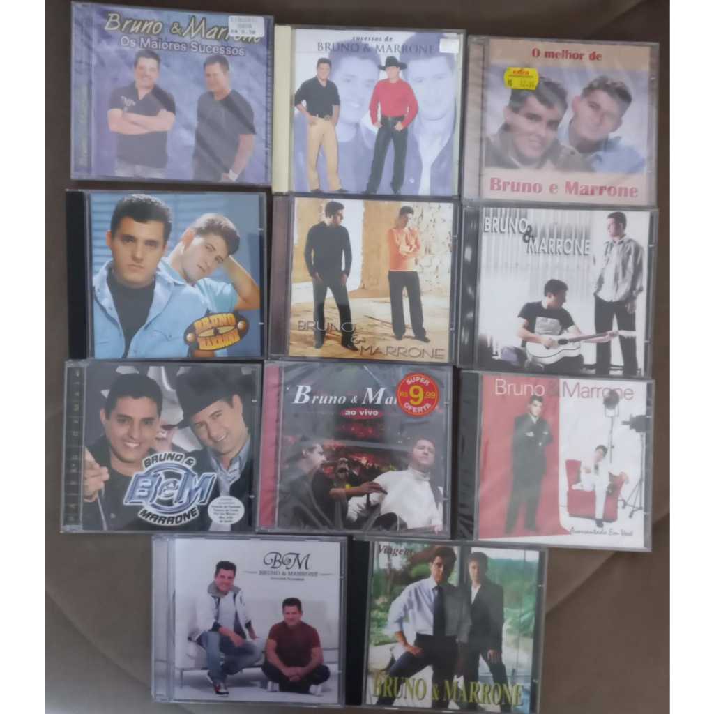 Cds bruno e Marrone Os maiores sucessos paixão demais inevitavel viagem acorrentado em voce ao vivo meu presente é