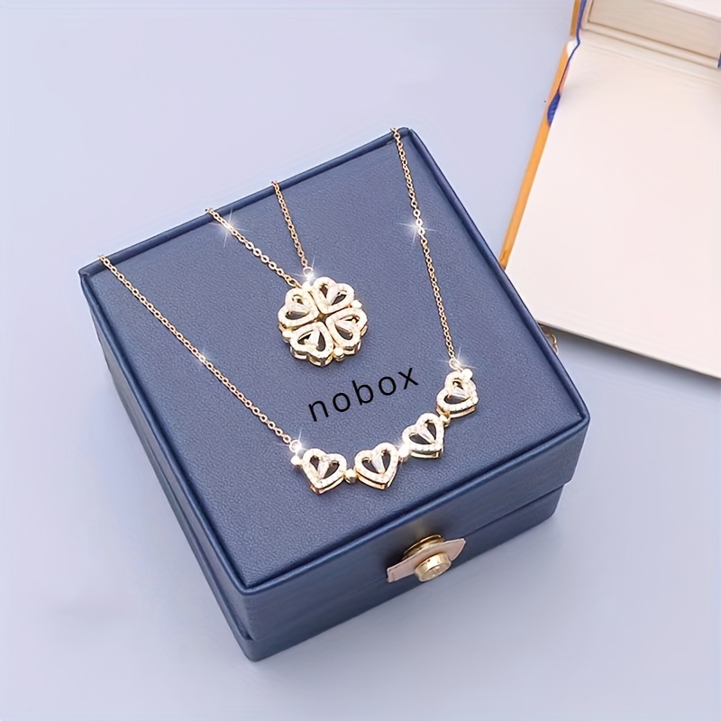 Colar com Pingente de Trevo de Quatro Folhas em Aço Inoxidável Prateado Abre-Fecha e Coração Pequeno de Zircônia em Oferta na Shopee