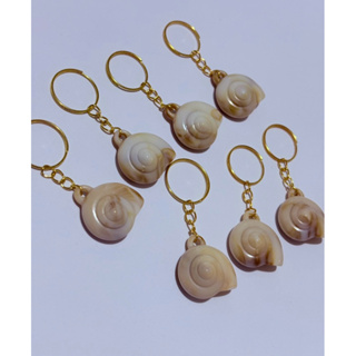 Kit com 20 Chaveiros Caracol em Resina em Oferta na Shopee