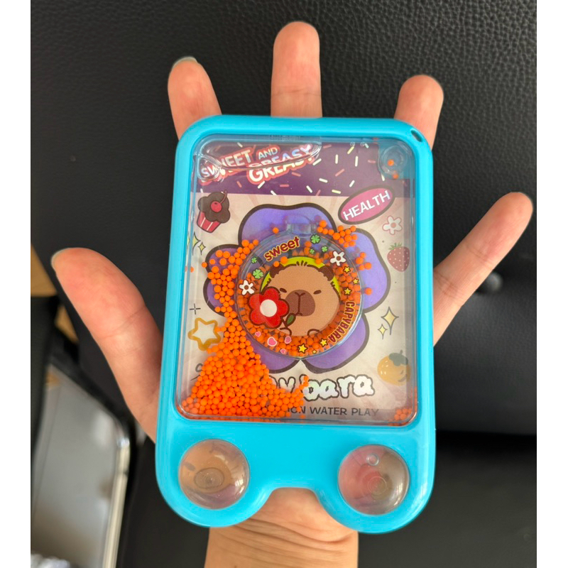 Jogo de argolas aquaplay capivara mini game de água transparente