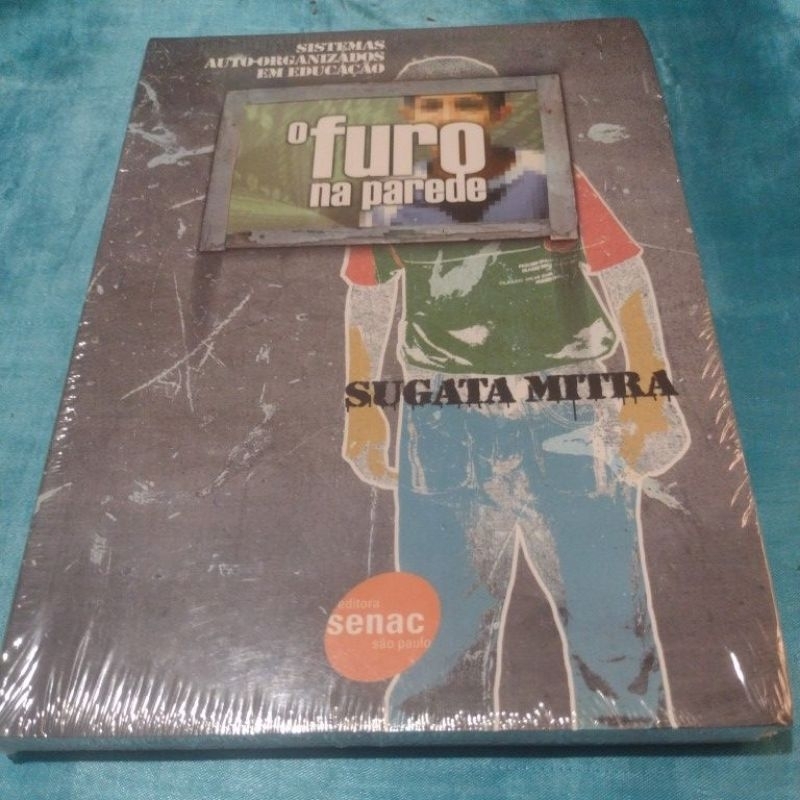 O Furo na Parede (Educação por meios de sistemas auto-organizados) Sugata Mitra (Livro Novo/Lacrado
